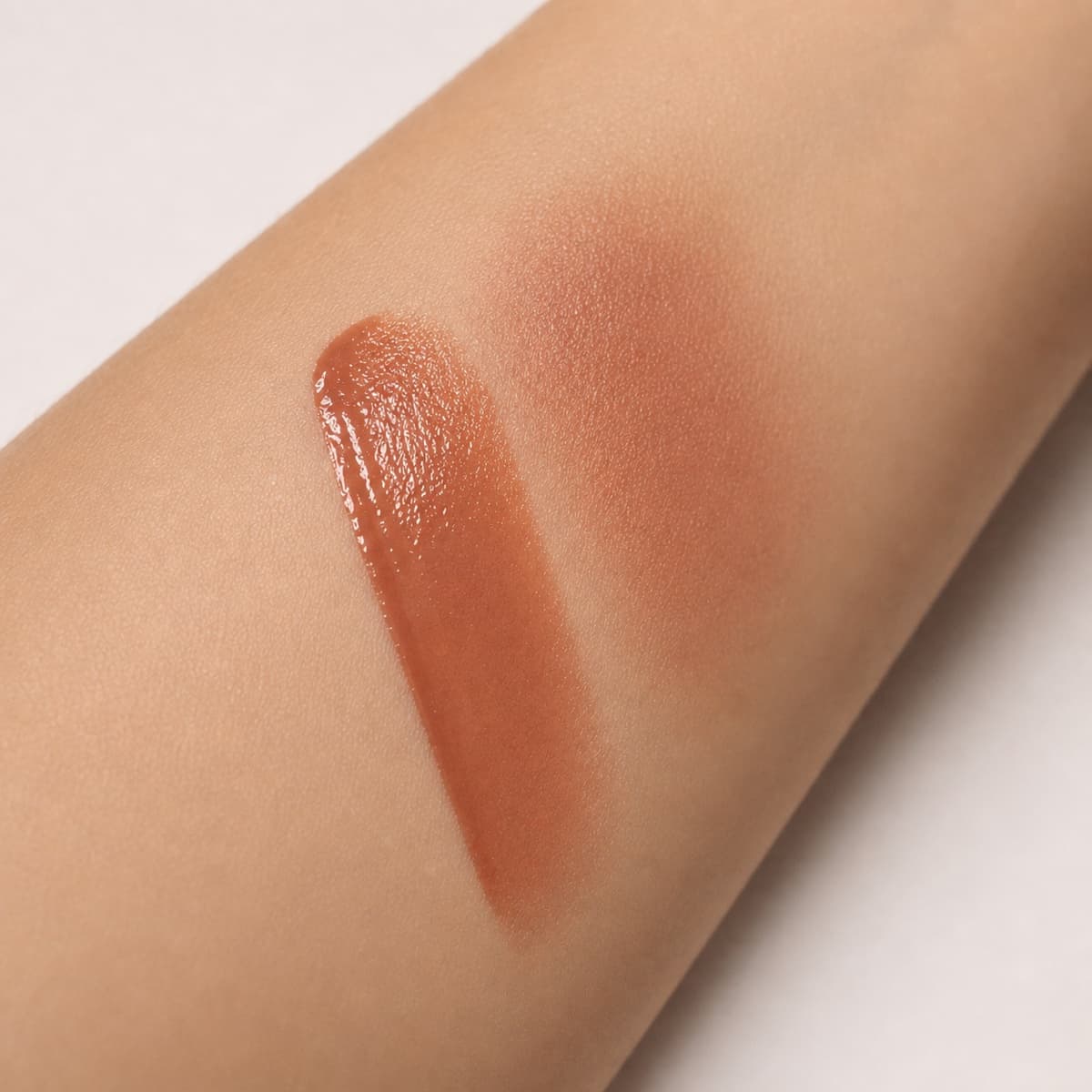 Bronze Shine tint texture swatched on skin